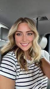 Blonde customer in striped shirt
